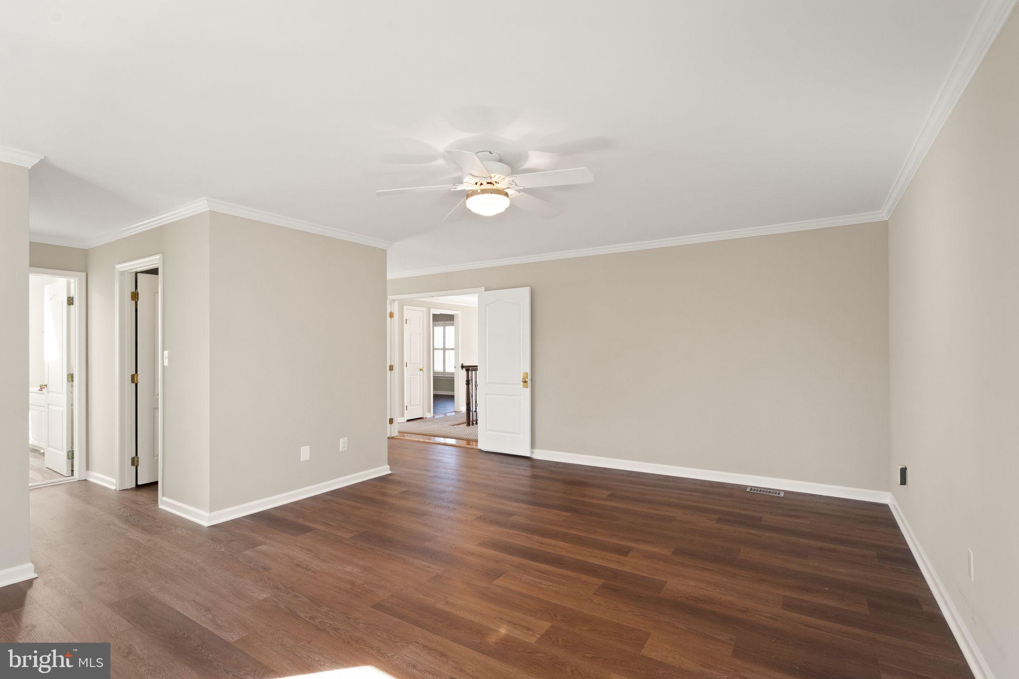 1327 Murray Downs Way Reston, VA 20194 - Photo 29 of 66 a view of an empty room with wooden floor