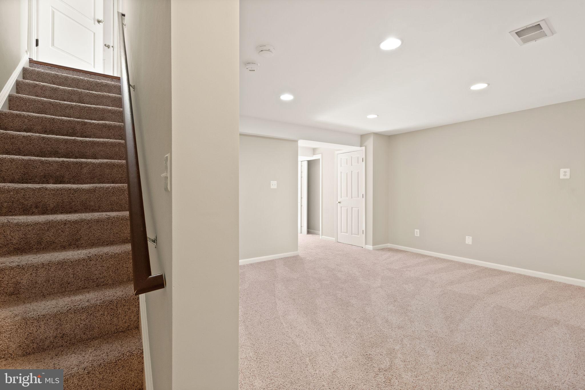 1327 Murray Downs Way Reston, VA 20194 - Photo 42 of 66 a view of an empty room with stairs