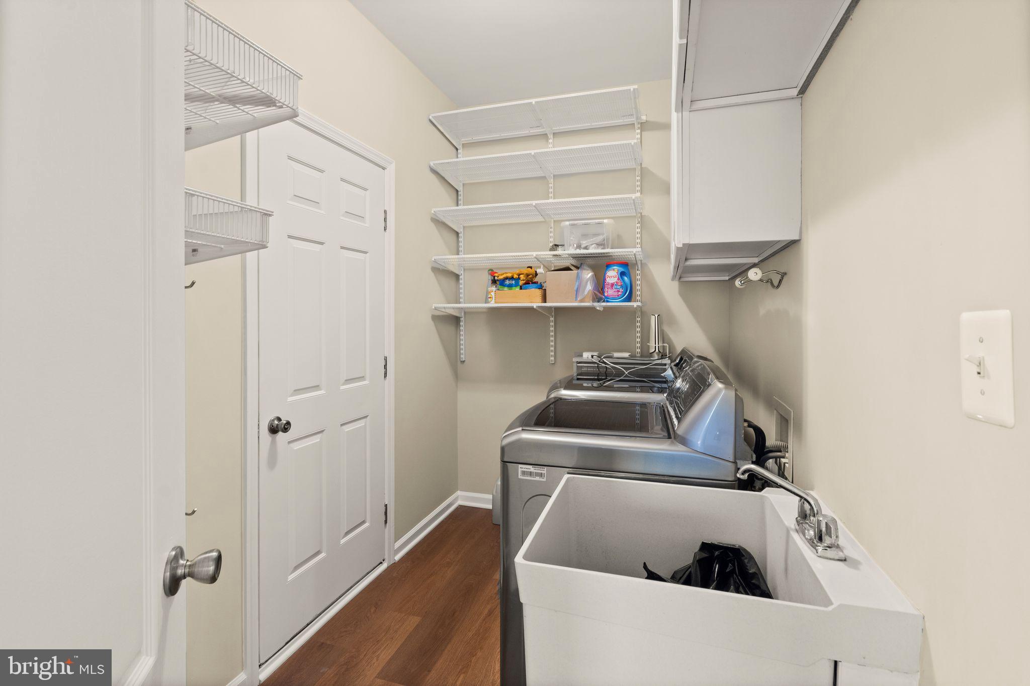 1327 Murray Downs Way Reston, VA 20194 - Photo 45 of 66 a utility room with dryer and washer