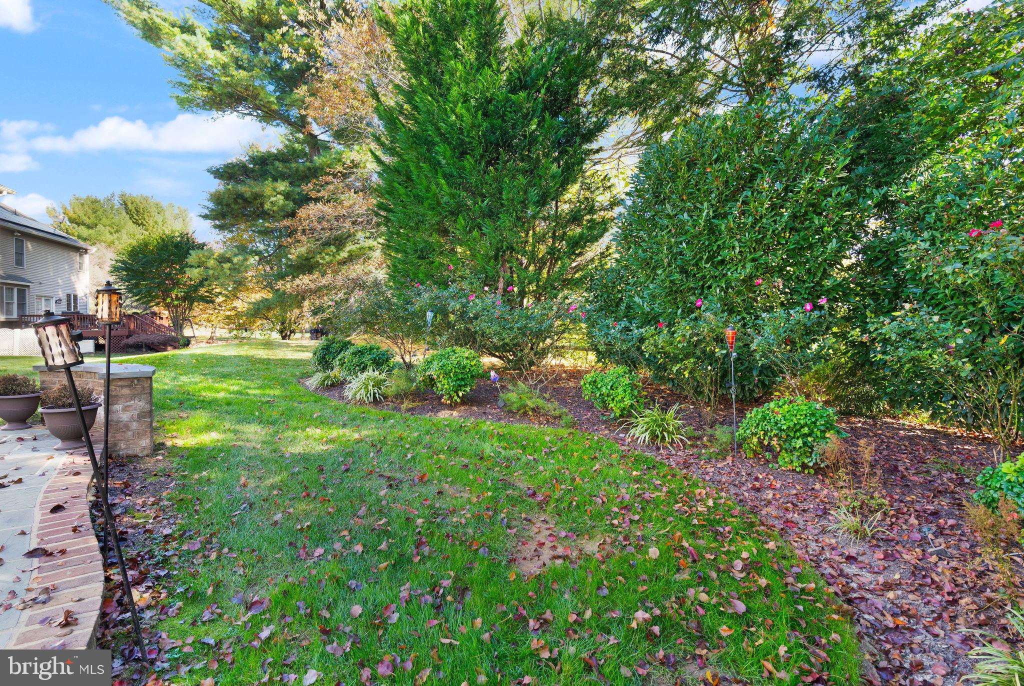 1327 Murray Downs Way Reston, VA 20194 - Photo 61 of 66 a view of backyard with seating area and green space