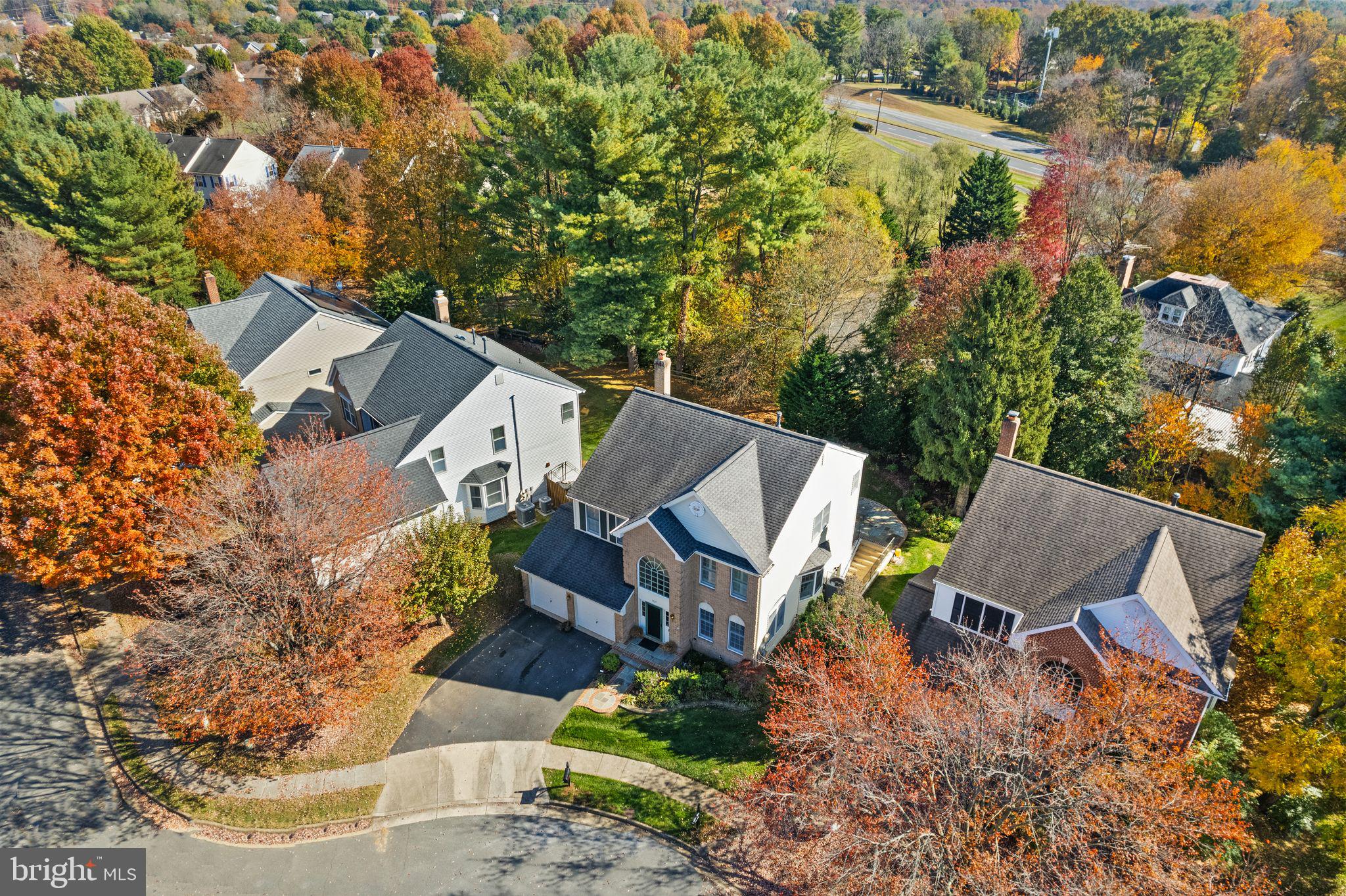 1327 Murray Downs Way Reston, VA 20194 - Photo 64 of 66 an aerial view of a house with a yard and lake view
