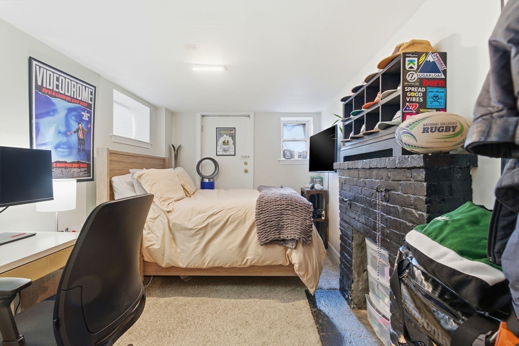 13 Knowlton Street Boston, MA 02127 - Photo 12 of 35 a bedroom with a bed and flat screen tv