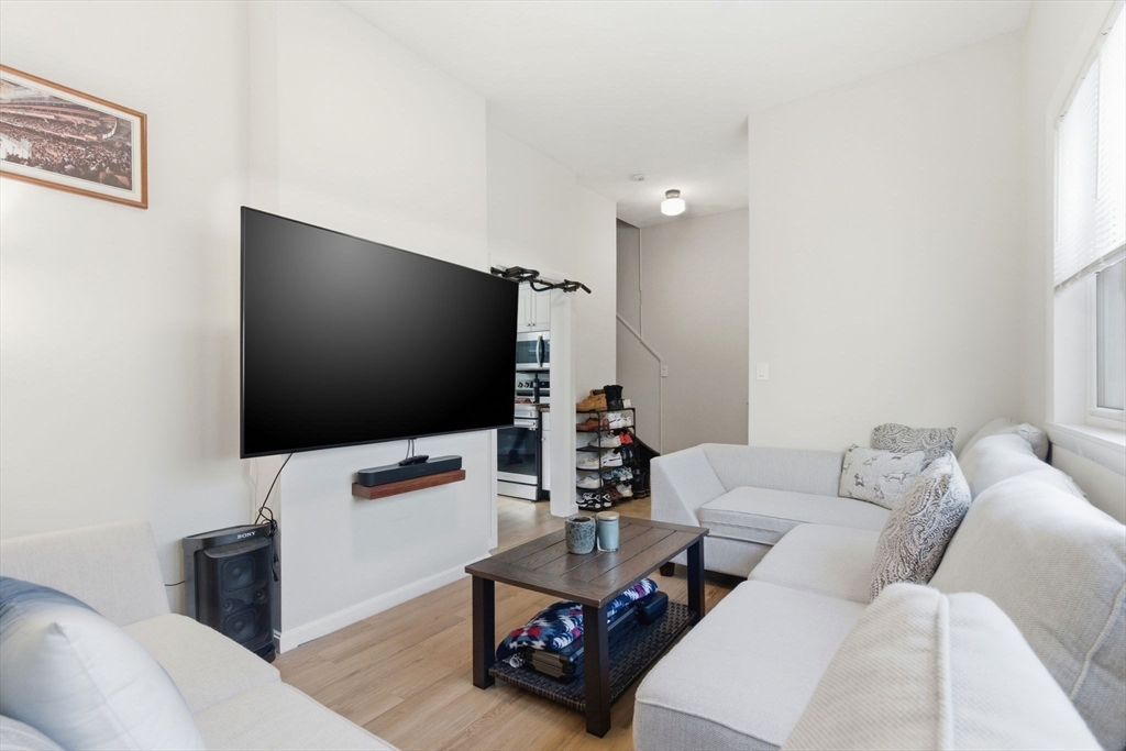13 Knowlton Street Boston, MA 02127 - Photo 16 of 35 a living room with furniture and a flat screen tv