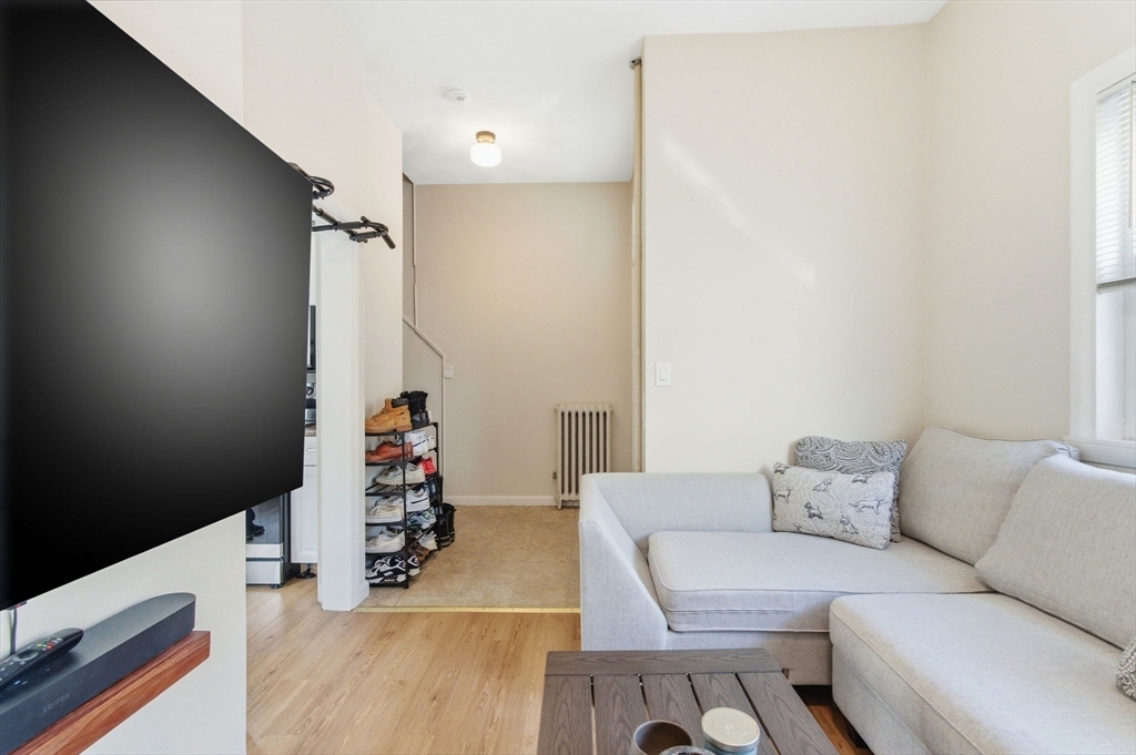13 Knowlton Street Boston, MA 02127 - Photo 18 of 35 a living room with furniture and flowers