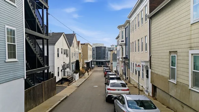 a city street lined with tall buildings