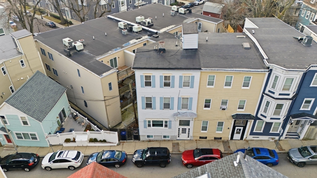 13 Knowlton Street Boston, MA 02127 - Photo 32 of 35 a car parked in front of a building