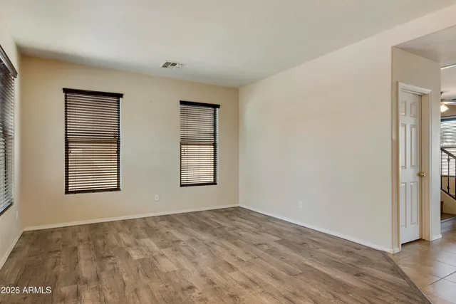 an empty room with windows