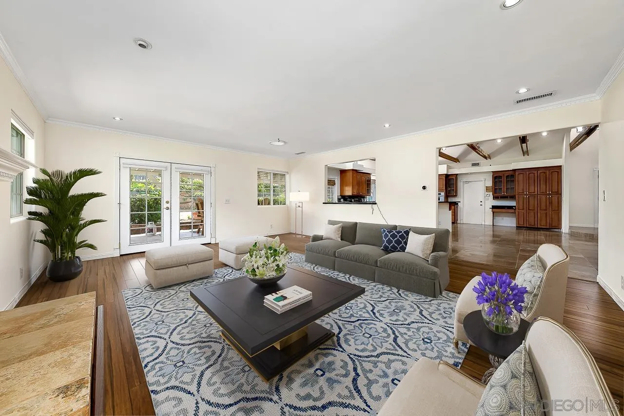 13610 Putney Road Poway, CA 92064 - Photo 12 of 62 a living room with furniture potted plant and a window