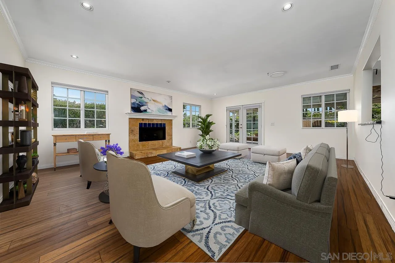 13610 Putney Road Poway, CA 92064 - Photo 14 of 62 a living room with furniture fireplace and a large window