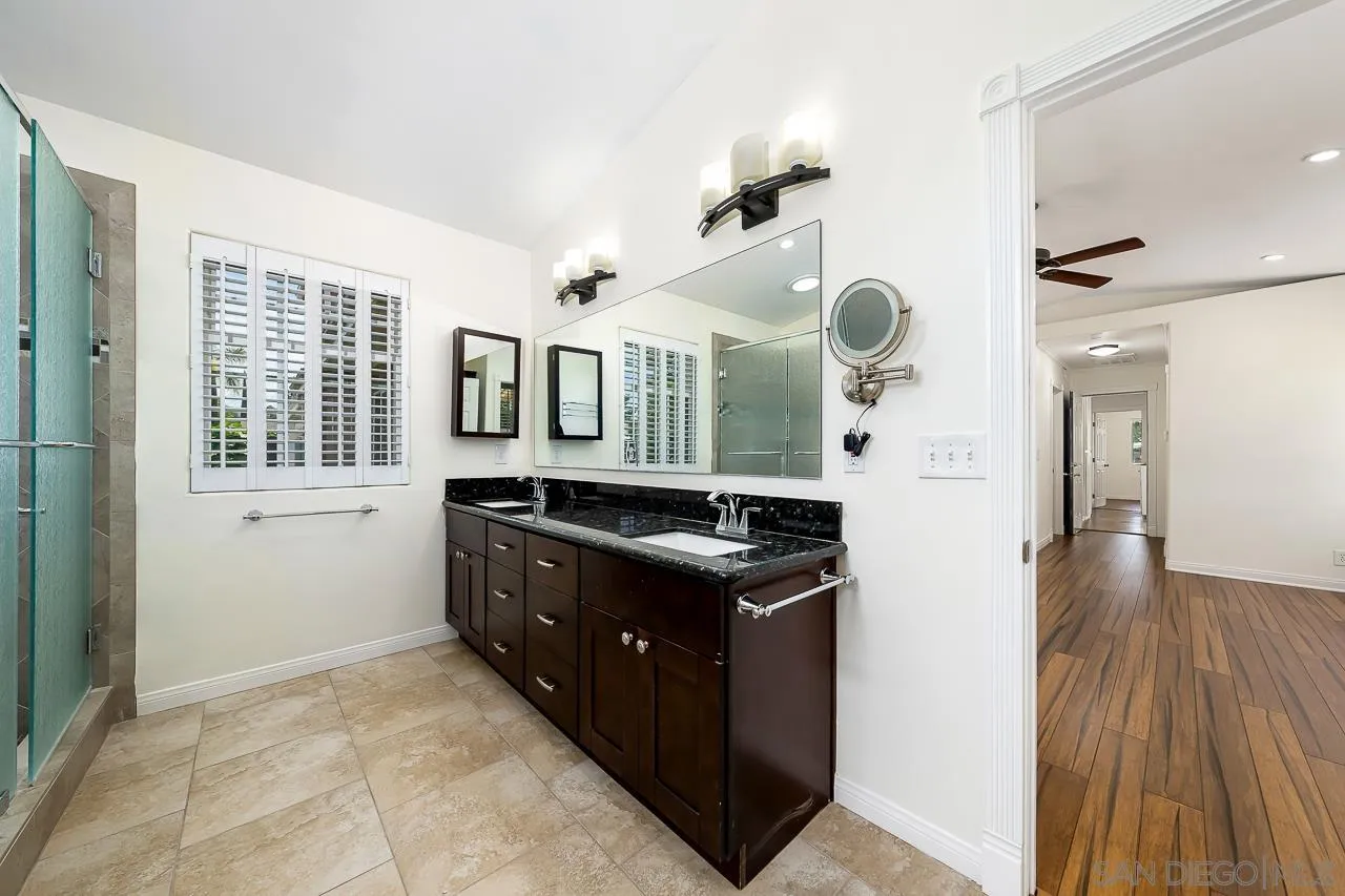 13610 Putney Road Poway, CA 92064 - Photo 20 of 62 a kitchen with granite countertop a stove and a sink