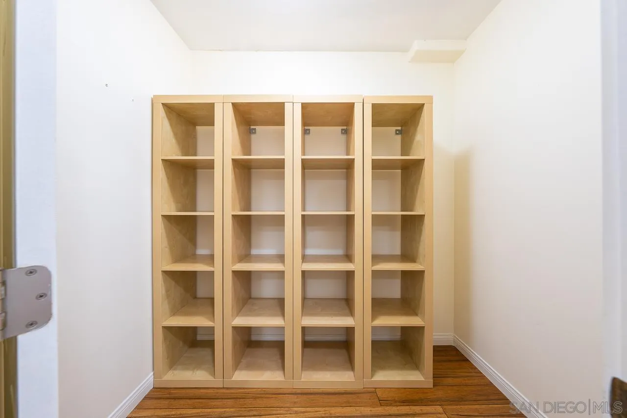 13610 Putney Road Poway, CA 92064 - Photo 21 of 62 a living room with a wooden floor