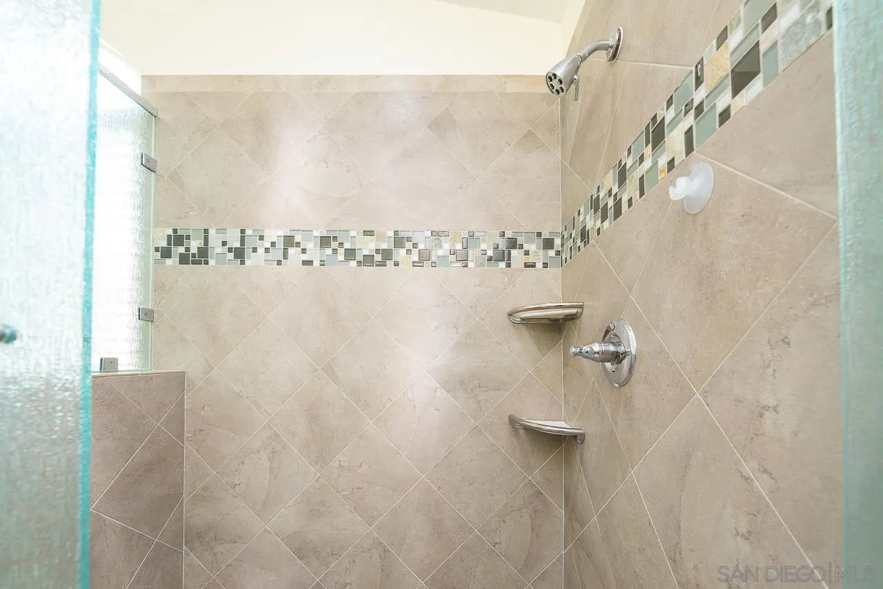 13610 Putney Road Poway, CA 92064 - Photo 25 of 62 a bathroom with a shower