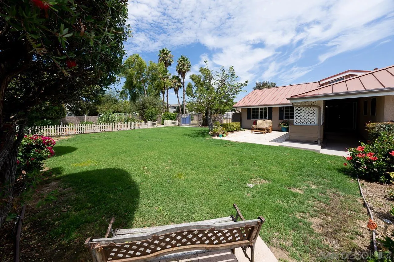 13610 Putney Road Poway, CA 92064 - Photo 31 of 62 a front view of a house with garden