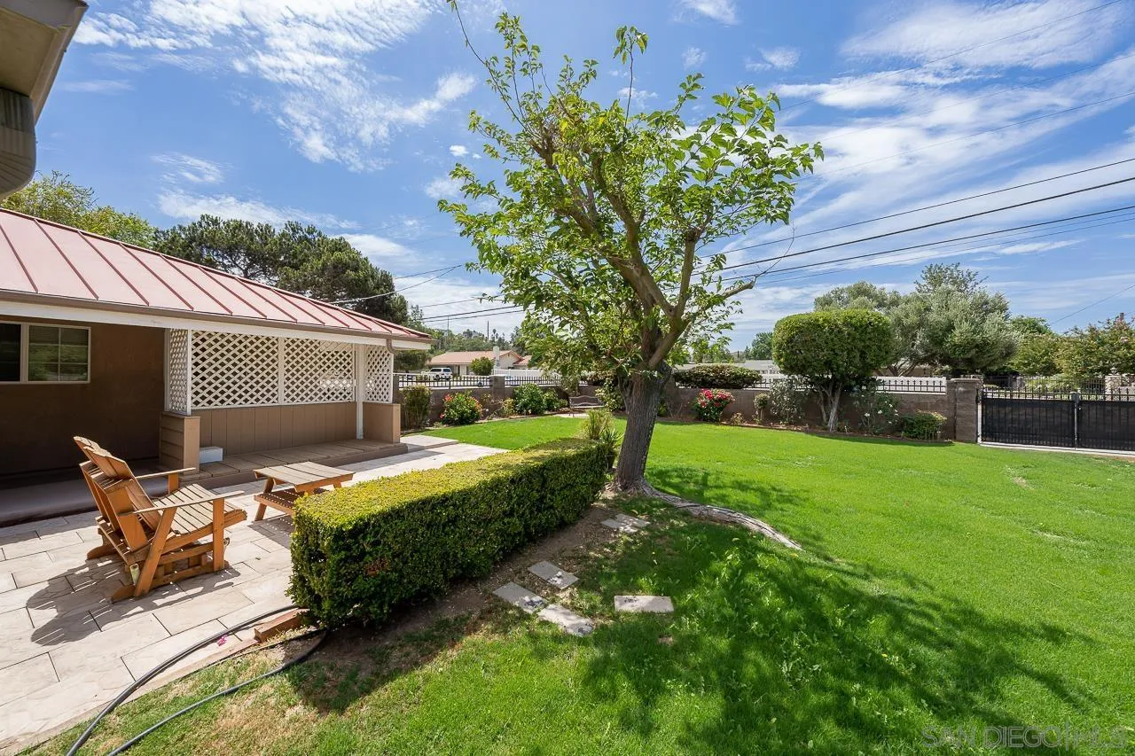 13610 Putney Road Poway, CA 92064 - Photo 32 of 62 a front view of a house with garden