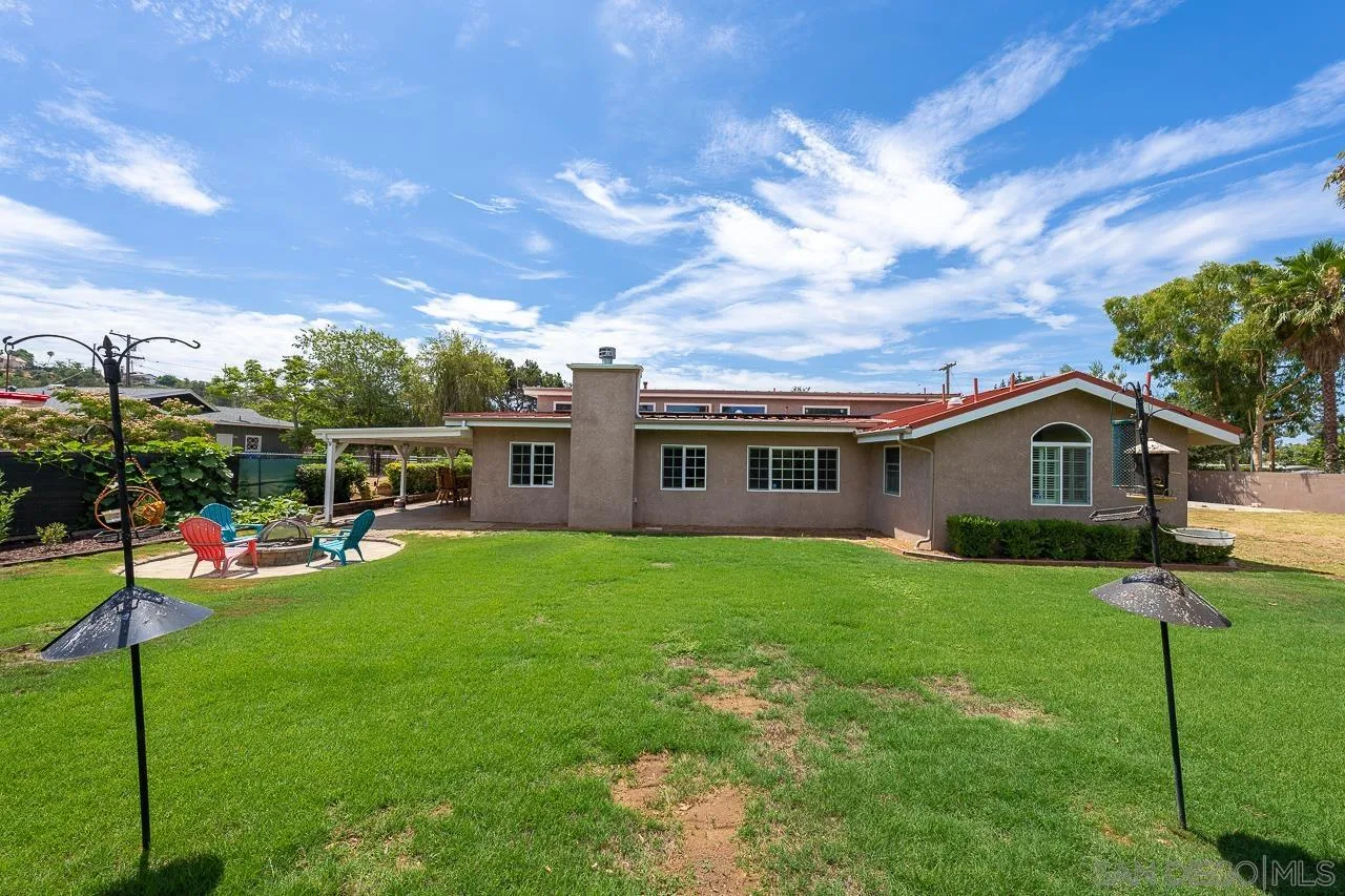 13610 Putney Road Poway, CA 92064 - Photo 49 of 62 a front view of a house with a garden