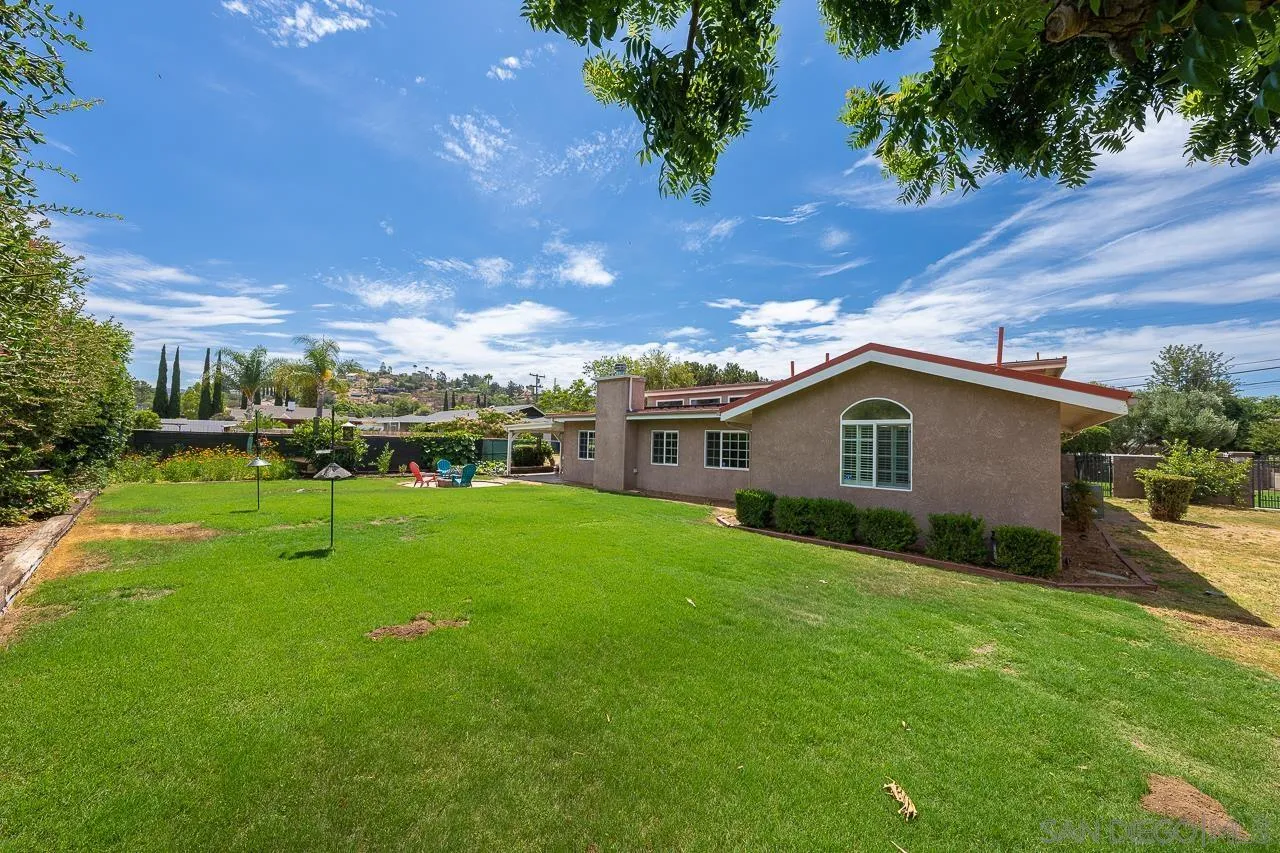 13610 Putney Road Poway, CA 92064 - Photo 50 of 62 a view of an house with backyard space and garden