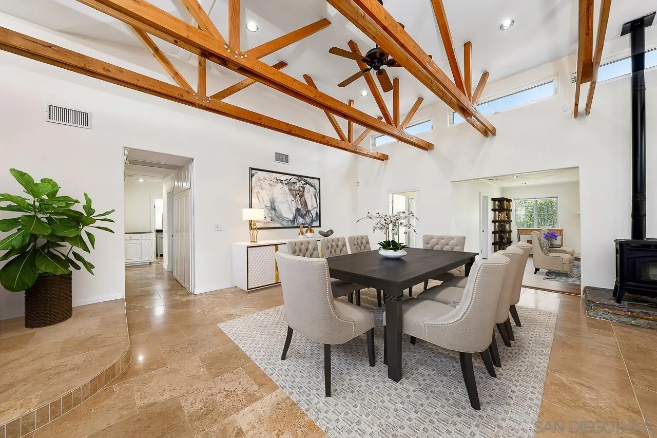 13610 Putney Road Poway, CA 92064 - Photo 6 of 62 a view of a dining room with furniture window and wooden floor