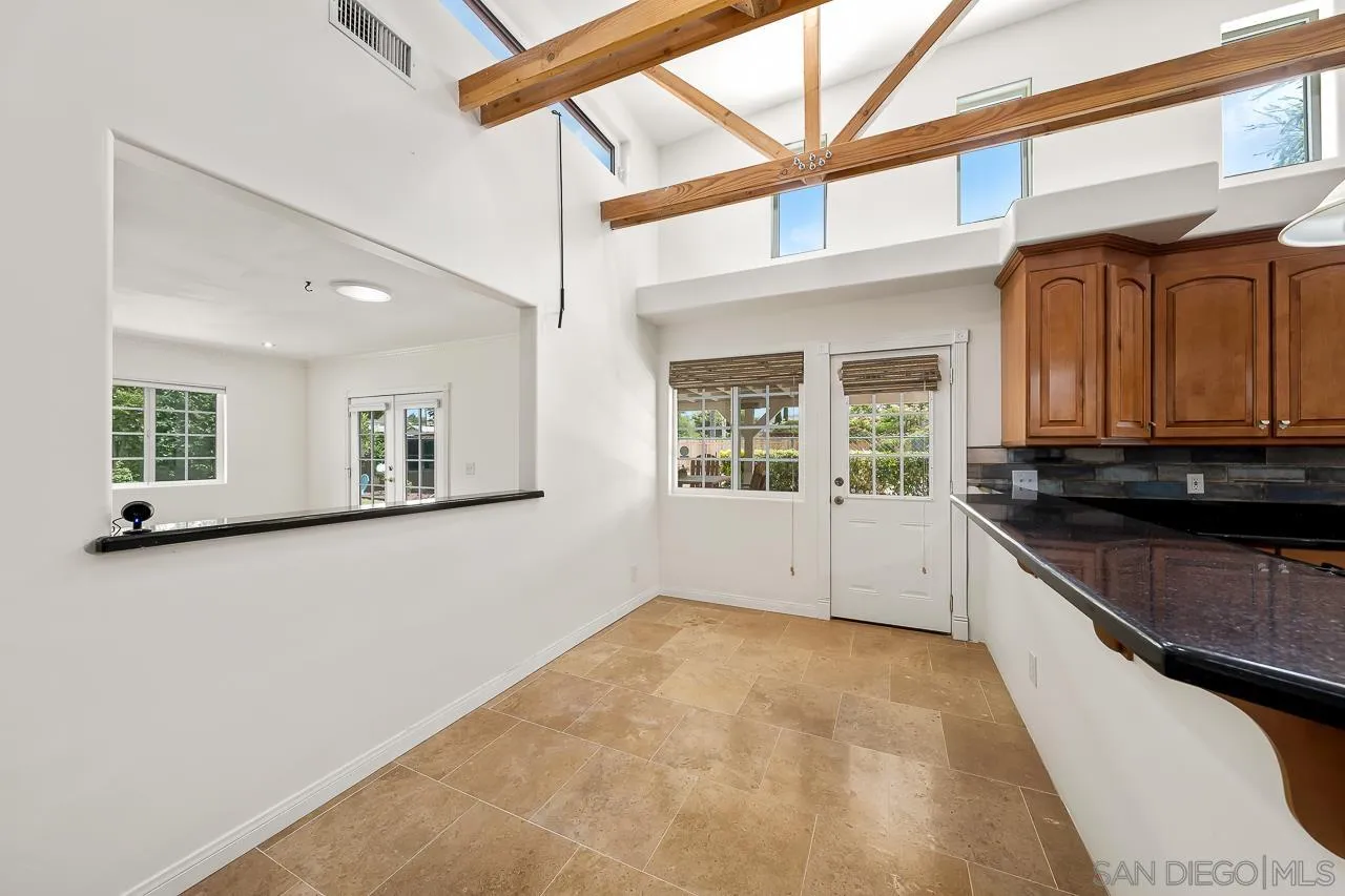 13610 Putney Road Poway, CA 92064 - Photo 9 of 62 an empty room with windows