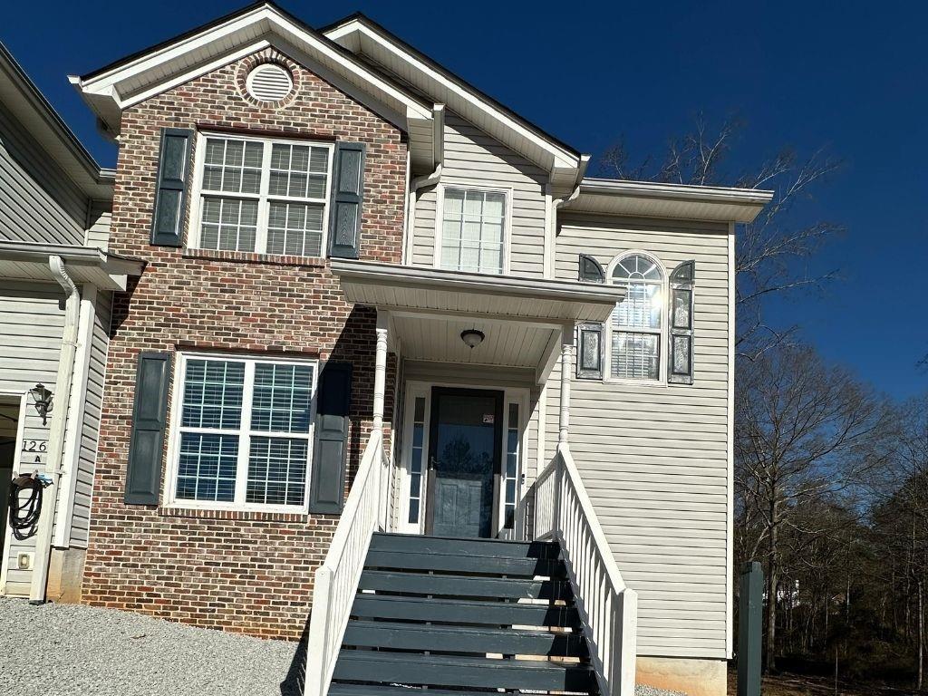 1261 Lakeview Road Grayson, GA 30017 - Photo 2 of 35 a front view of a house with a large window