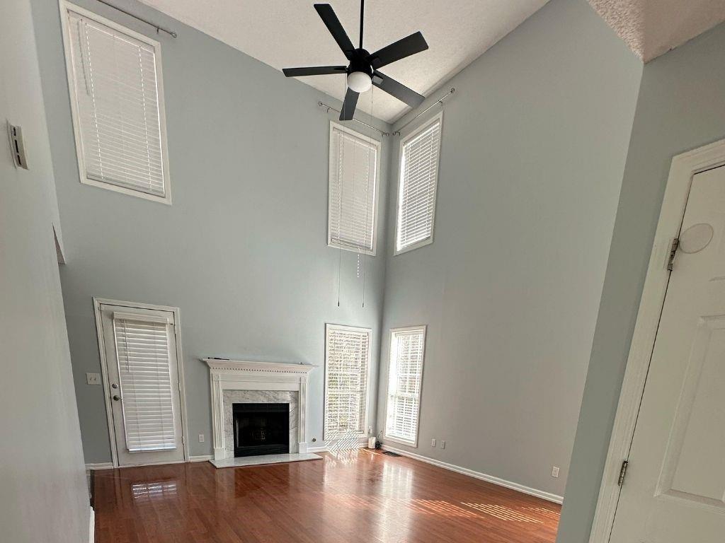 1261 Lakeview Road Grayson, GA 30017 - Photo 23 of 35 a view of an empty room with wooden floor and a window