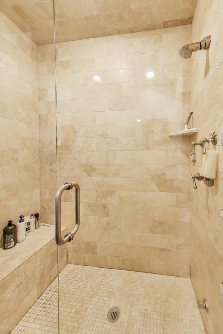 456 West Briar Place, Unit 2 Chicago, IL 60657 - Photo 17 of 25 a bathroom with a shower
