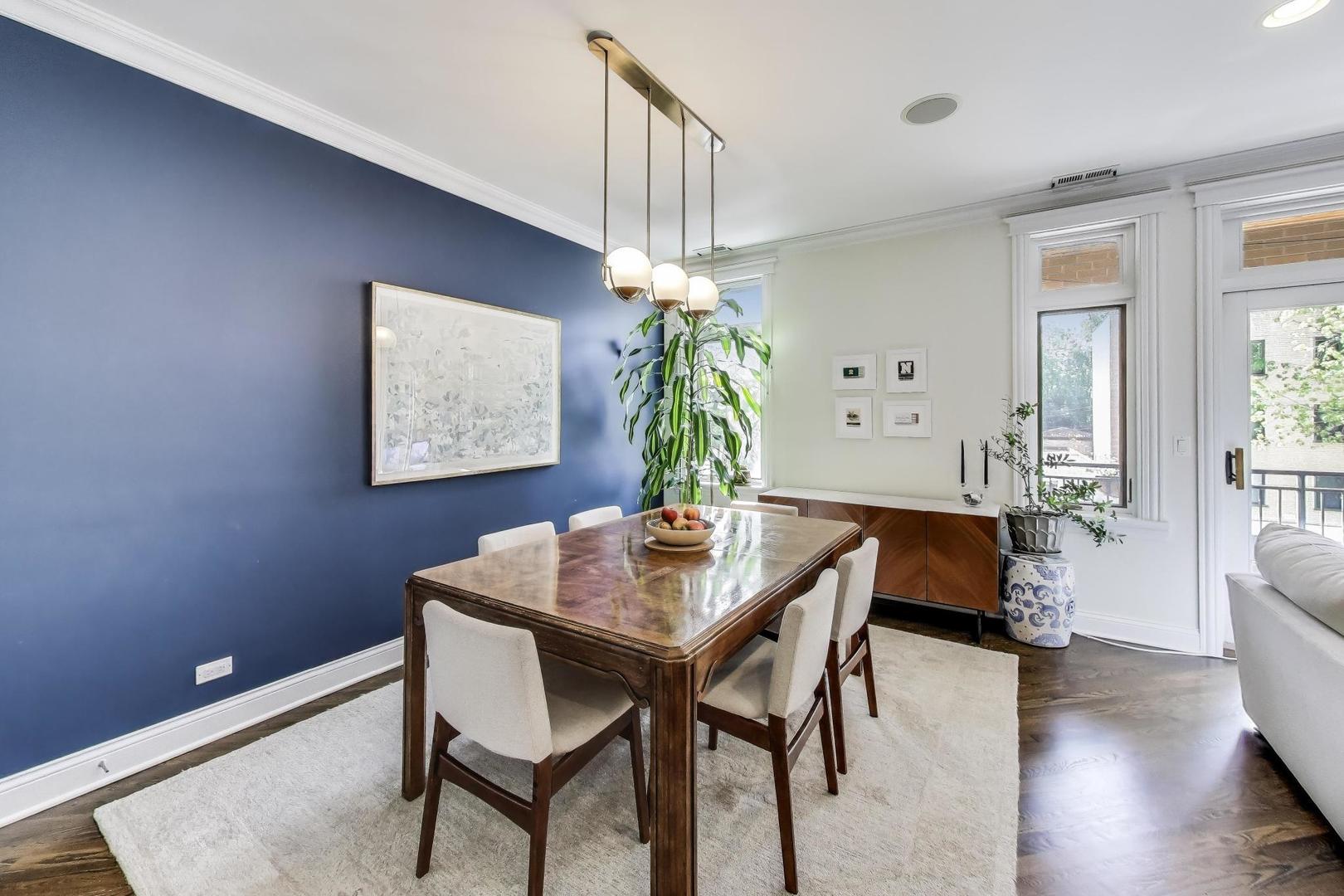456 West Briar Place, Unit 2 Chicago, IL 60657 - Photo 7 of 25 a dining room with furniture and window