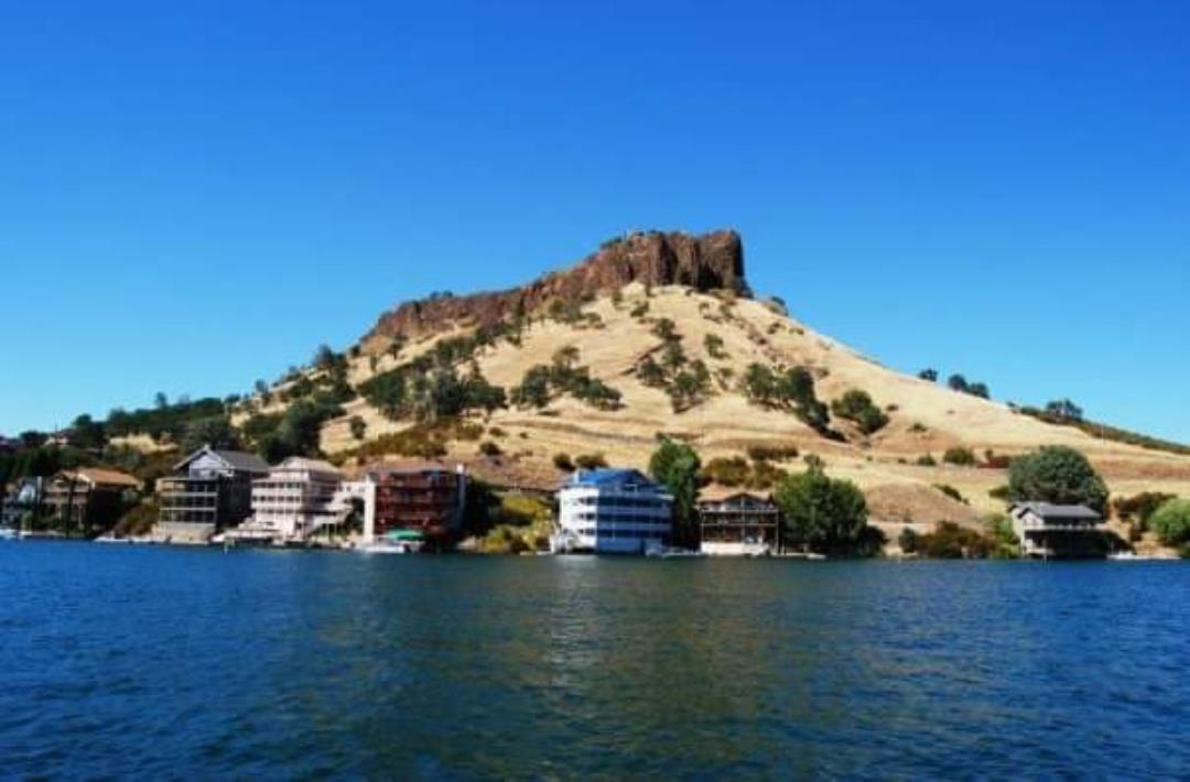 2307 Arrowhead Street Copperopolis, CA 95228 - Photo 12 of 18 a tall building with a view of lake