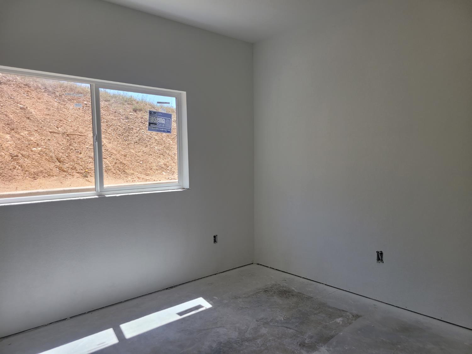 2307 Arrowhead Street Copperopolis, CA 95228 - Photo 17 of 32 an empty room with a window