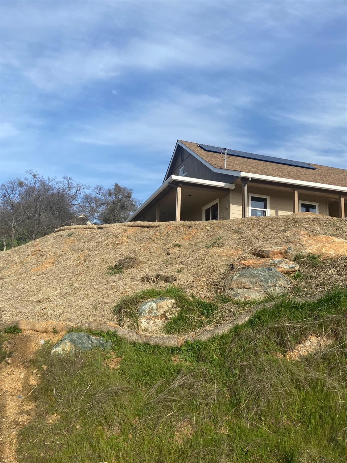 2307 Arrowhead Street Copperopolis, CA 95228 - Photo 6 of 18 a front view of a house with a yard
