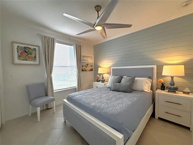 an aerial view of a house with a yard basket ball court and outdoor seating