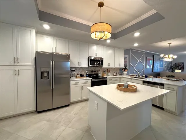 a view of a living room and dining room