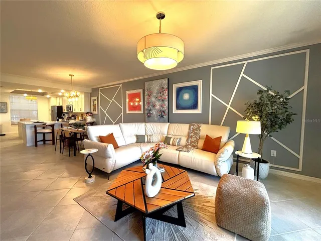 a bedroom with furniture and flat screen tv