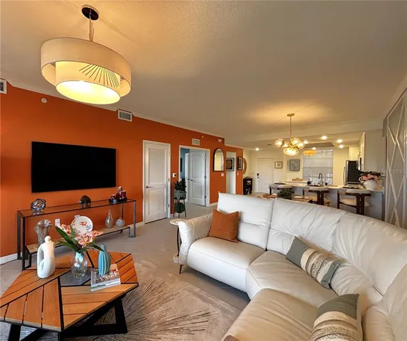 a bathroom with a sink double vanity granite tub shower and a mirror