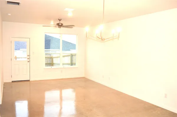 a view of an empty room and window