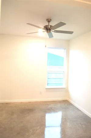 a view of a window in an empty room