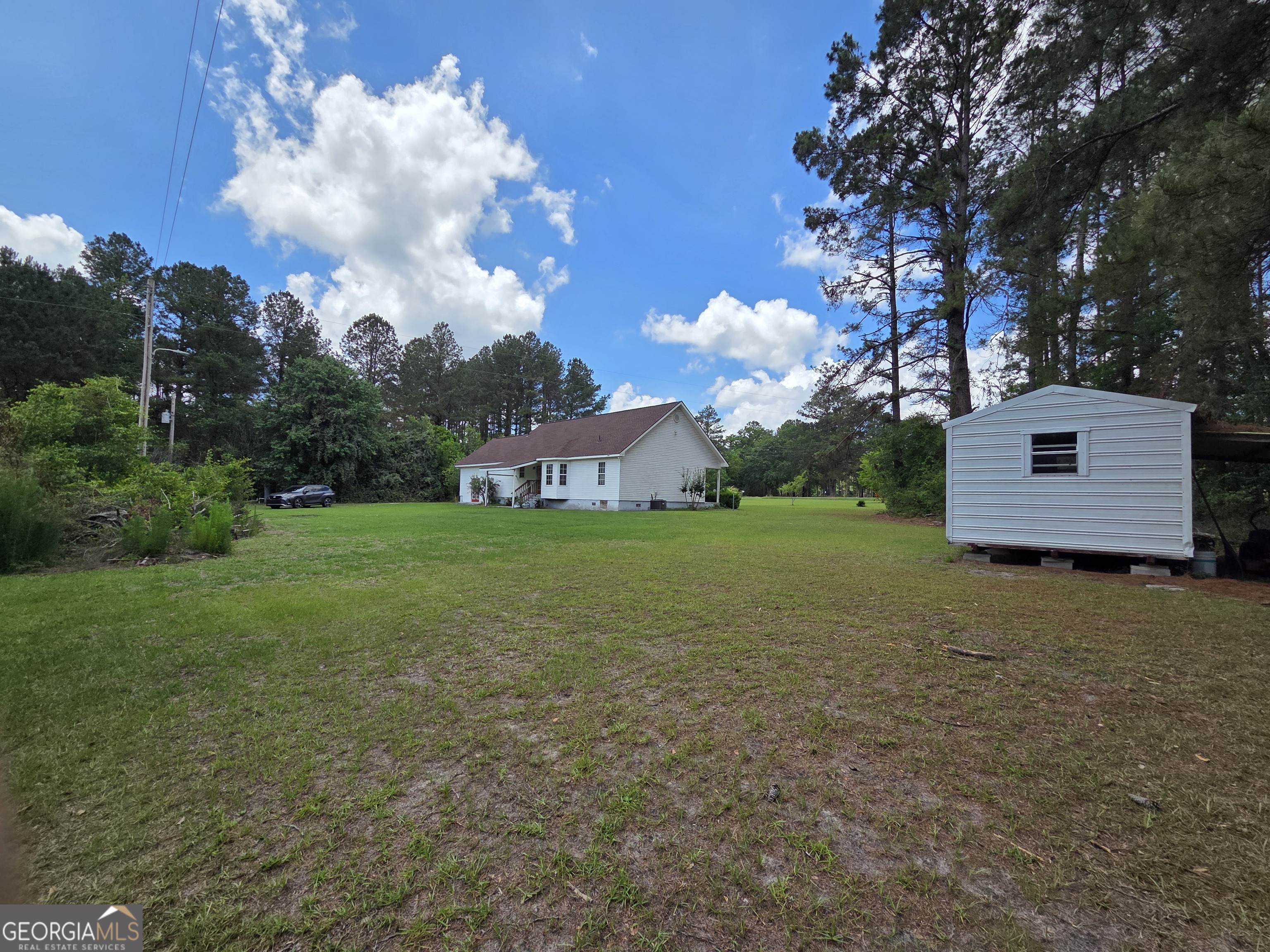 9546 Union Road Metter, GA 30439 - Photo 41 of 45 a backyard of a house with lots of green space