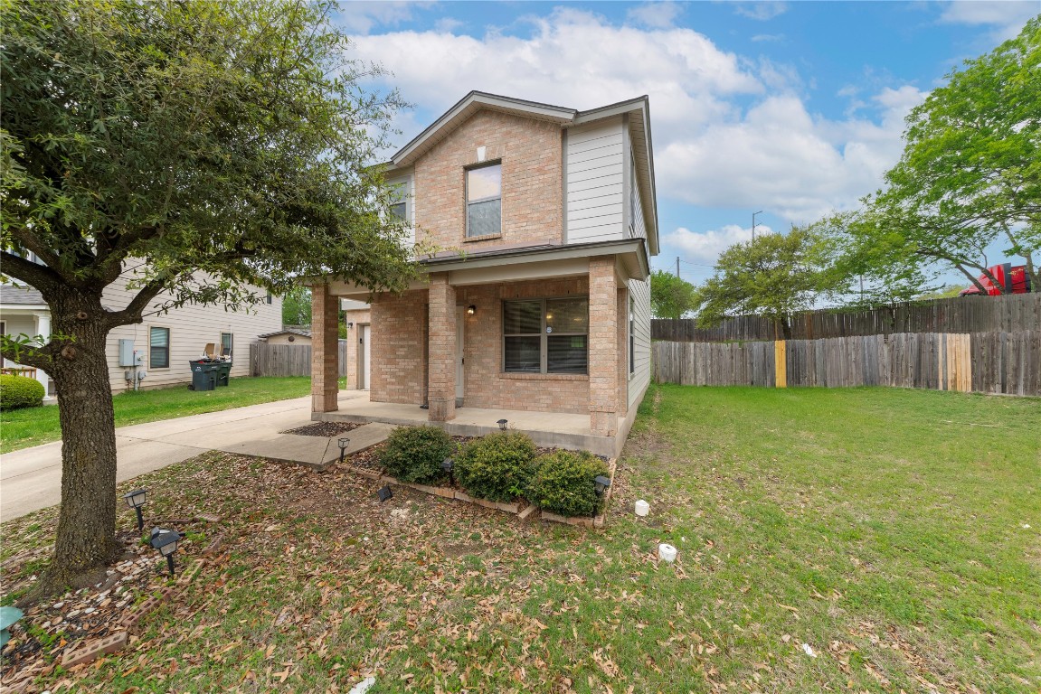 13700 Merseyside Drive Pflugerville, TX 78660 - Photo 1 of 1 a front view of a house with garden