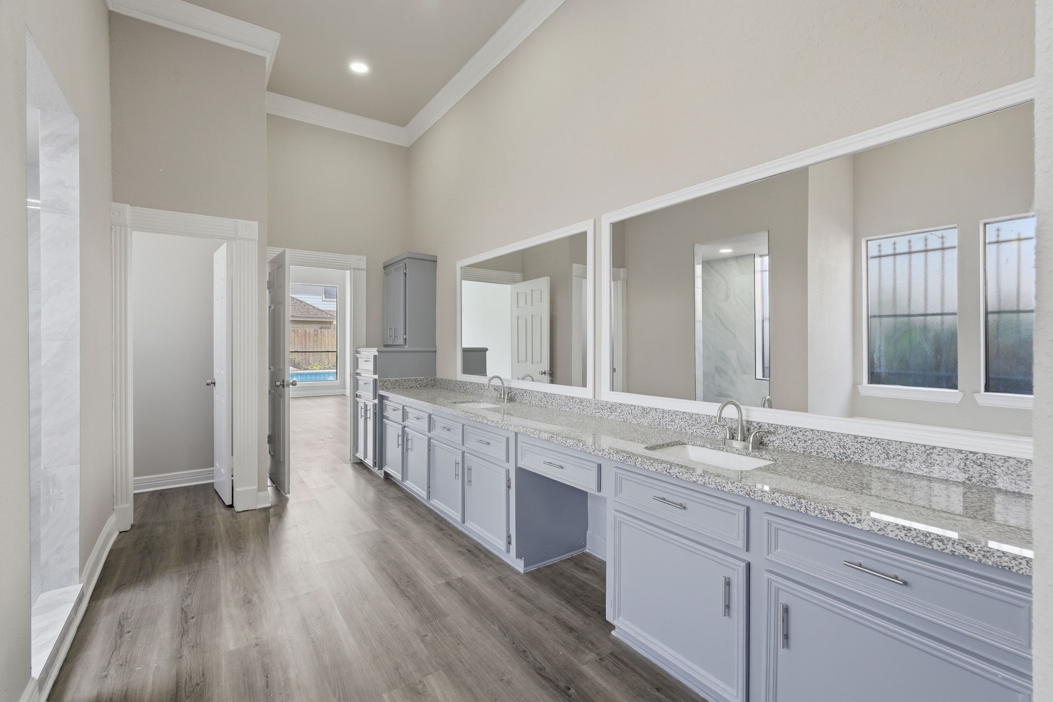 7611 Naremore Drive Spring, TX 77379 - Photo 22 of 48 Spa-like Primary Bathroom. Dual Sinks, vanity, and great storage space!
