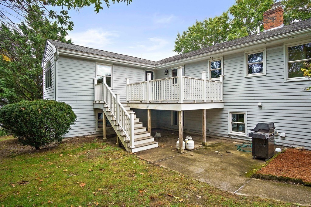 19 Murdoch Road Stoneham, MA 02180 - Photo 37 of 45 a front view of a house with a yard