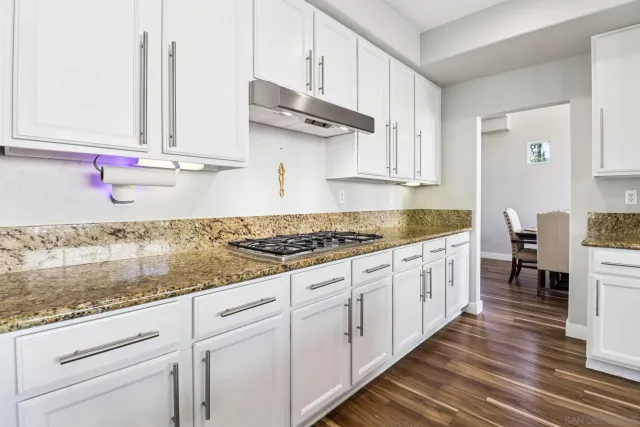 a view of a workspace with furniture