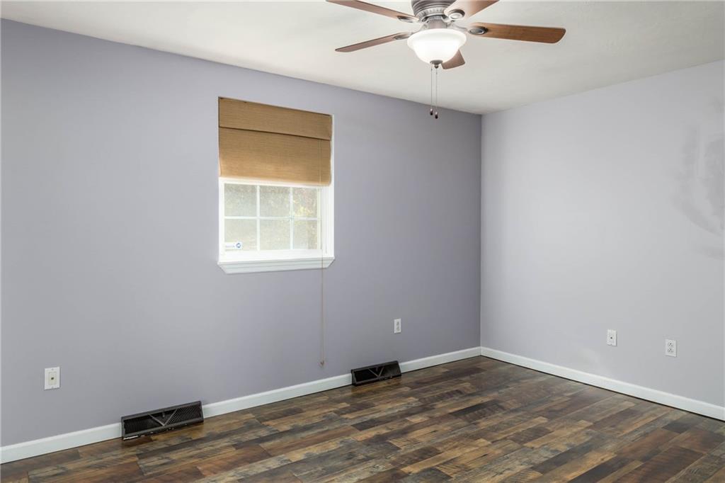 166 Country Club Road Washington, PA 15301 - Photo 15 of 32 wooden floor in an empty room with a window