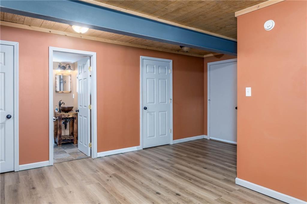 166 Country Club Road Washington, PA 15301 - Photo 22 of 32 a view of an empty room with wooden floor and closet