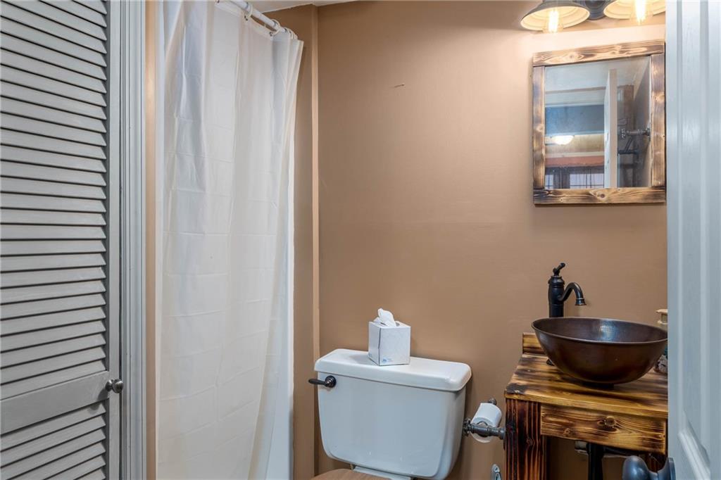 166 Country Club Road Washington, PA 15301 - Photo 23 of 32 a kitchen with a toilet and a sink