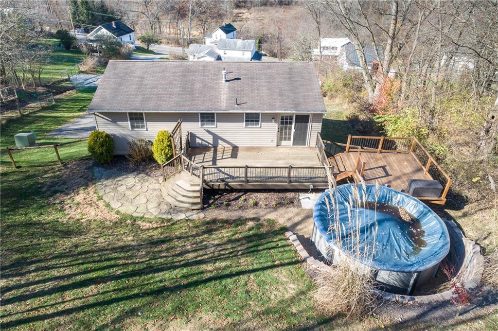 166 Country Club Road Washington, PA 15301 - Photo 30 of 32 an aerial view of a house with swimming pool and outdoor seating