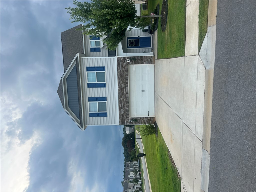 234 Samuel Street Pendleton, SC 29670 - Photo 1 of 17 A charming two-story residence presents a stone and siding facade with an attached garage and a neatly maintained front lawn.
