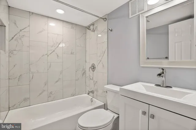 a view of a kitchen with washer and dryer