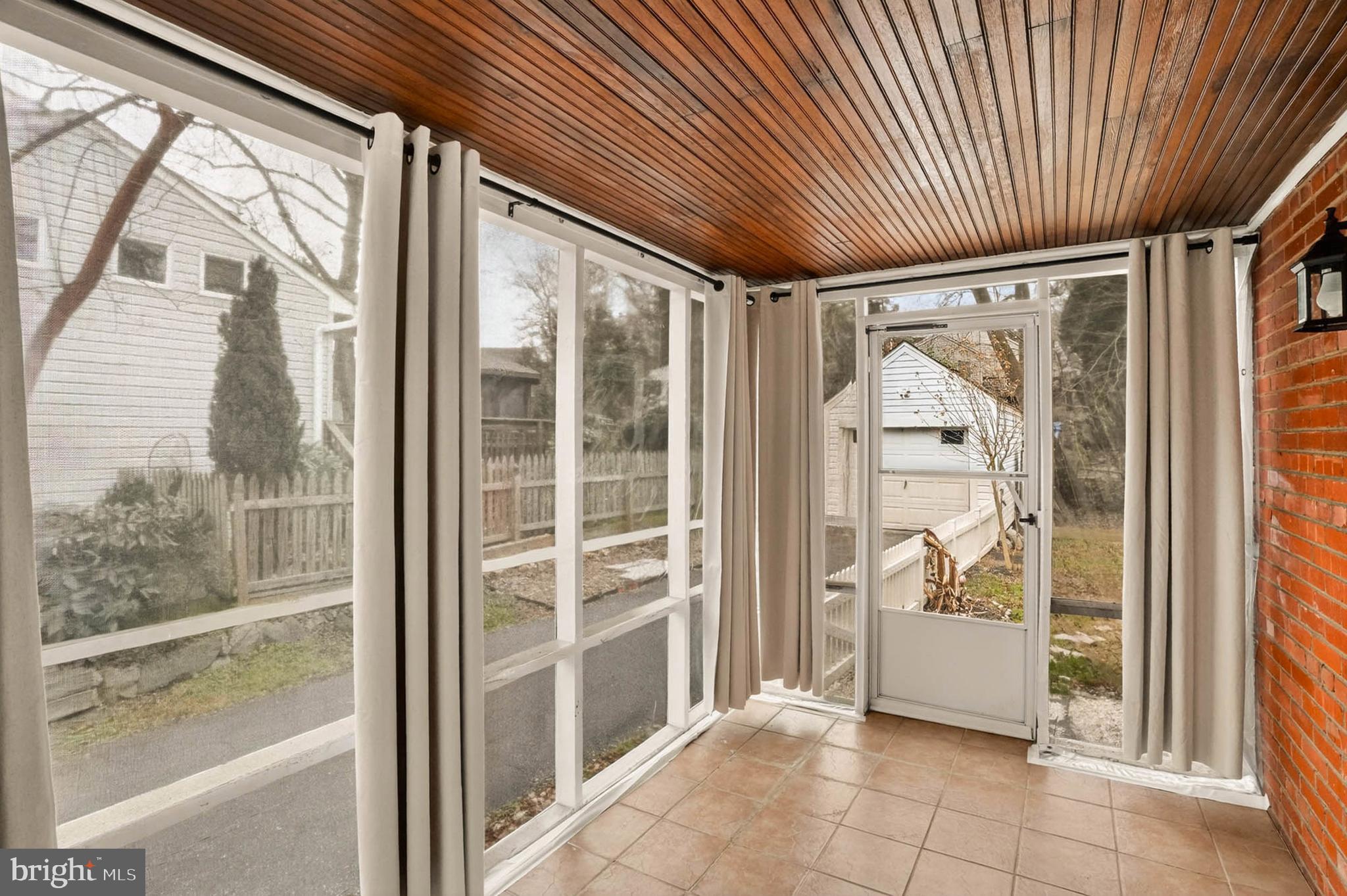 110 Melbourne Avenue Silver Spring, MD 20901 - Photo 4 of 33 Window lined porch