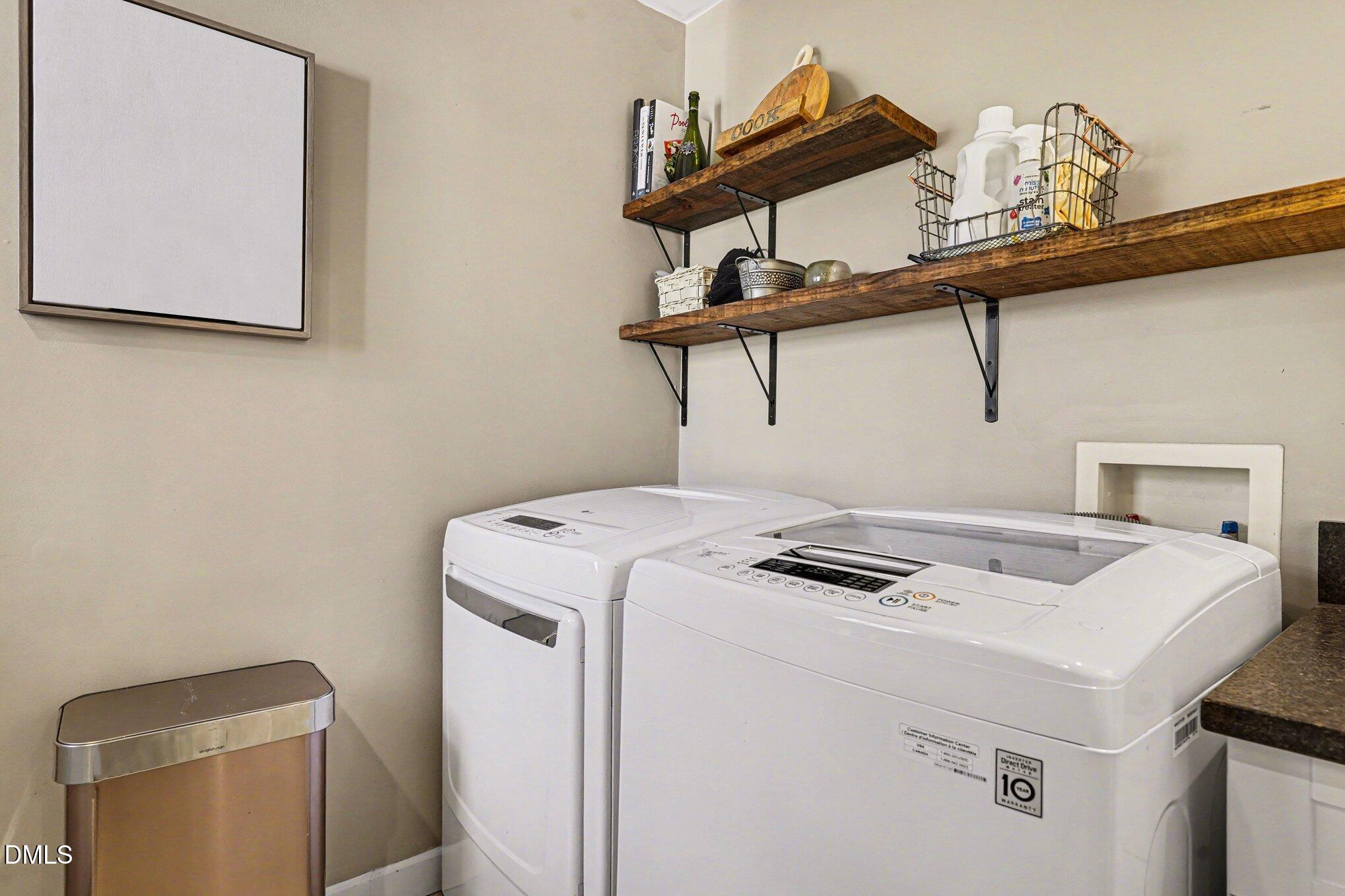 3400 Octavia Street Raleigh, NC 27606 - Photo 16 of 36 a utility room with dryer and washer