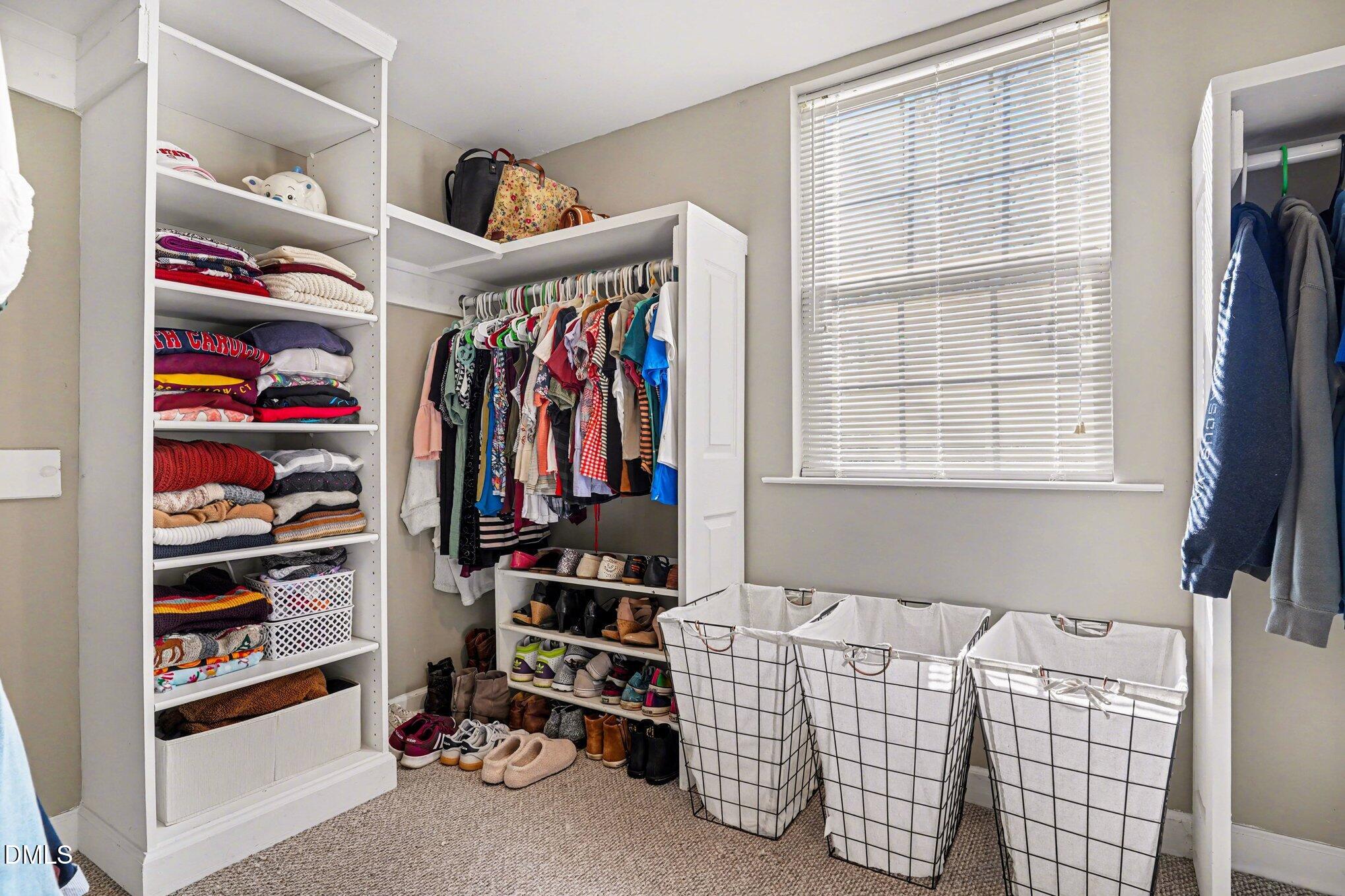 3400 Octavia Street Raleigh, NC 27606 - Photo 19 of 36 a bedroom with furniture and a window