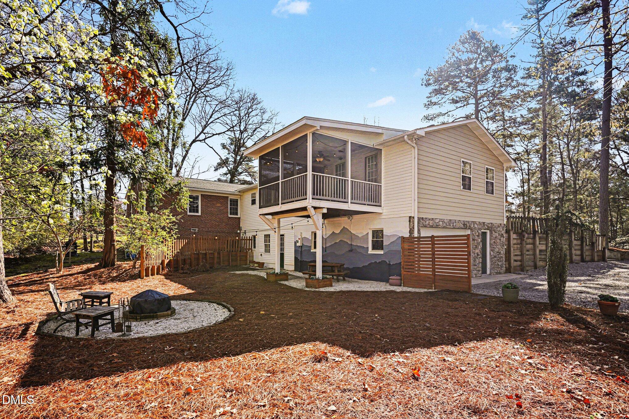 3400 Octavia Street Raleigh, NC 27606 - Photo 28 of 36 a front view of a house with a yard